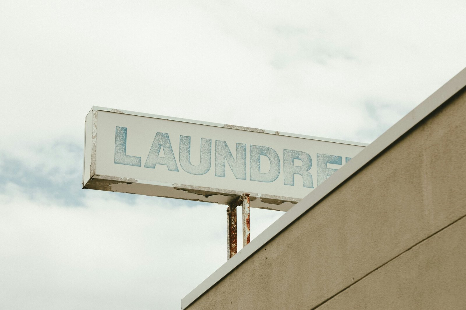 a street sign on top of a building